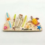 POLY MAGNET W/ DOLPHIN LIGHT HOUSE & SAND